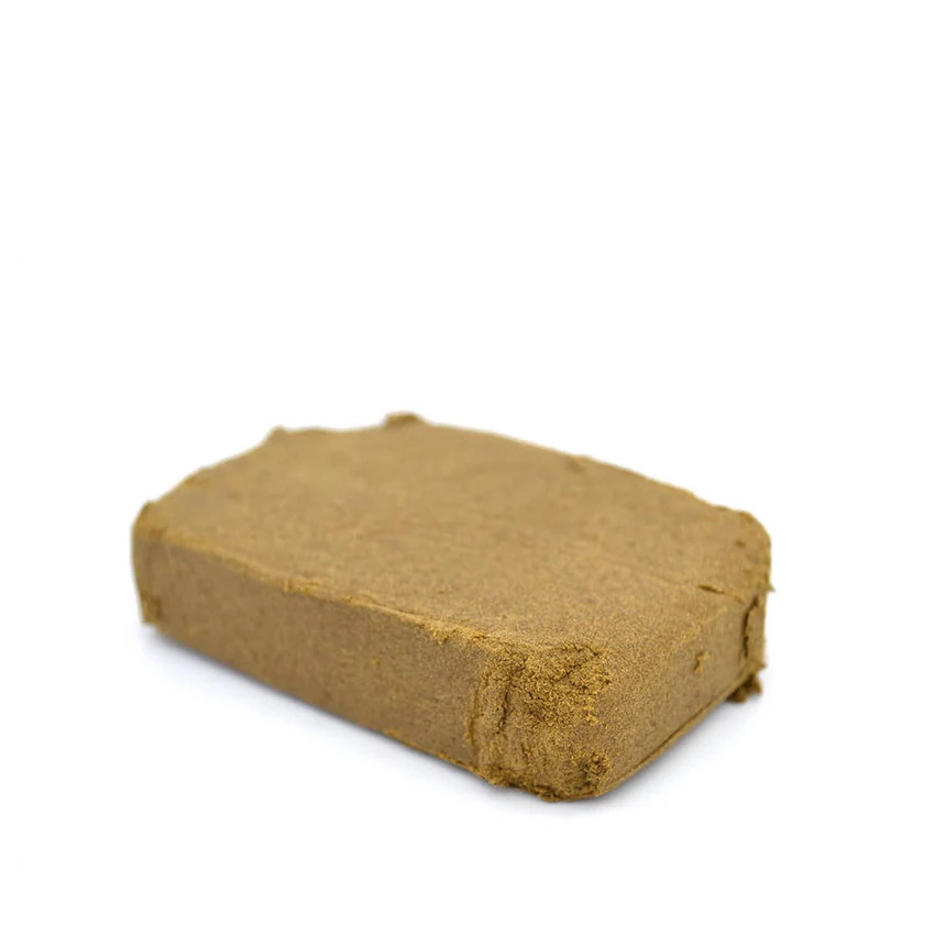 Jaune Mousseux CBD de CBDSOL Bloque de resina Jaune Mousseux CBD de CBDSOL sobre fondo blanco.